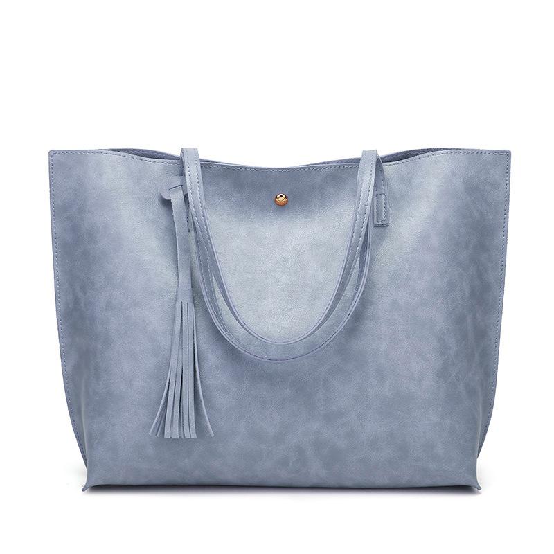 Modische Damen Tasche mit Quasten