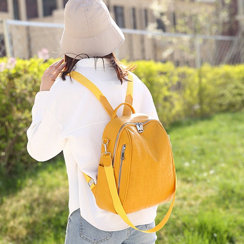 Modischer Rucksack mit einfachem Buchstabenmuster