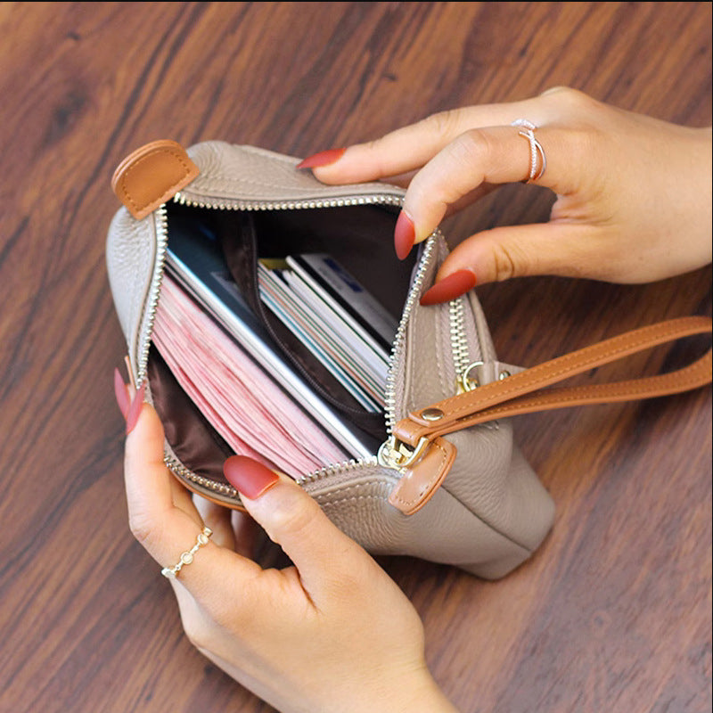 Handliche Leder-Clutch, große Geldbörse mit Reißverschluss am Handgelenk
