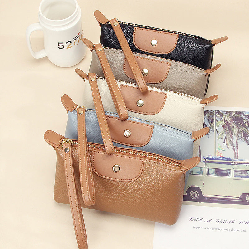 Handliche Leder-Clutch, große Geldbörse mit Reißverschluss am Handgelenk